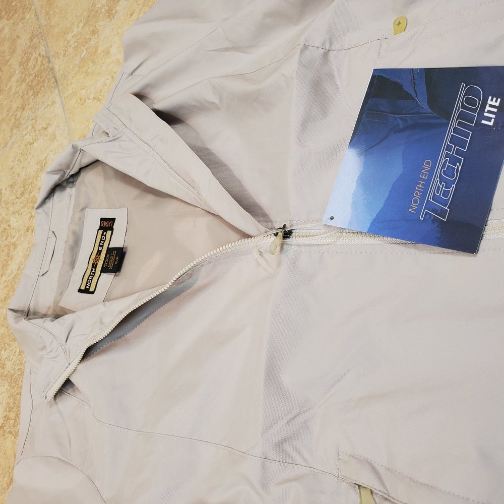 LADIES' SHORT SLEEVE FULL-ZIP WIND JACKET NWT